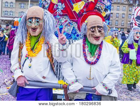 BASEL SWITZERLAND - MARCH 08 : Participants in the Basel Carnival in Basel Switzerland on March 08 2017. The Basel carnival has been listed as one of the top local festivities in Europe