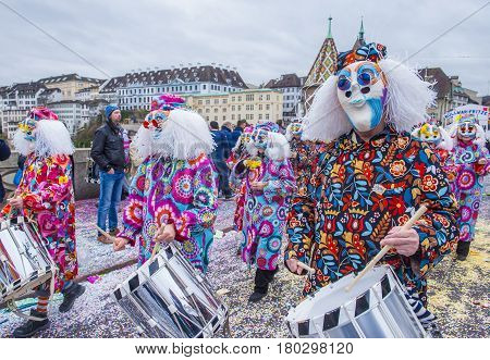 BASEL SWITZERLAND - MARCH 08 : Participants in the Basel Carnival in Basel Switzerland on March 08 2017. The Basel carnival has been listed as one of the top local festivities in Europe