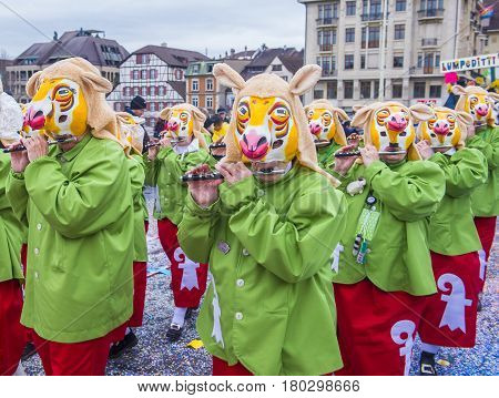 BASEL SWITZERLAND - MARCH 08 : Participants in the Basel Carnival in Basel Switzerland on March 08 2017. The Basel carnival has been listed as one of the top local festivities in Europe