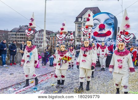 BASEL SWITZERLAND - MARCH 08 : Participants in the Basel Carnival in Basel Switzerland on March 08 2017. The Basel carnival has been listed as one of the top local festivities in Europe