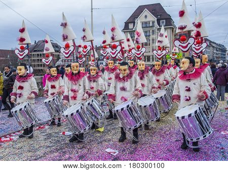 BASEL SWITZERLAND - MARCH 08 : Participants in the Basel Carnival in Basel Switzerland on March 08 2017. The Basel carnival has been listed as one of the top local festivities in Europe