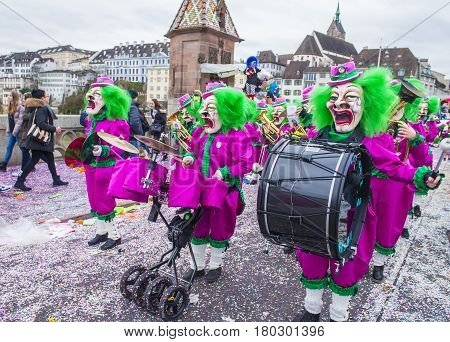 BASEL SWITZERLAND - MARCH 08 : Participants in the Basel Carnival in Basel Switzerland on March 08 2017. The Basel carnival has been listed as one of the top local festivities in Europe