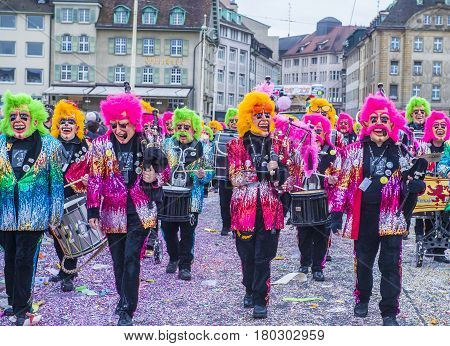 BASEL SWITZERLAND - MARCH 08 : Participants in the Basel Carnival in Basel Switzerland on March 08 2017. The Basel carnival has been listed as one of the top local festivities in Europe