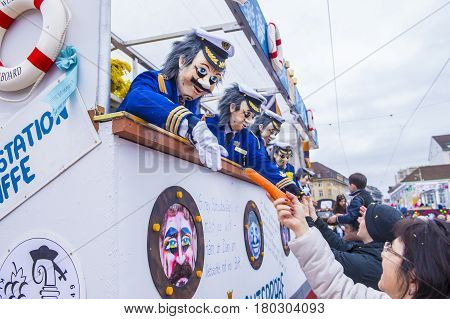BASEL SWITZERLAND - MARCH 08 : Participants in the Basel Carnival in Basel Switzerland on March 08 2017. The Basel carnival has been listed as one of the top local festivities in Europe