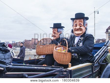 BASEL SWITZERLAND - MARCH 08 : Participants in the Basel Carnival in Basel Switzerland on March 08 2017. The Basel carnival has been listed as one of the top local festivities in Europe