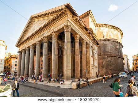 ROME - OCTOBER 2, 2012: Tourists visit the Pantheon. Pantheon is a famous monument of ancient Roman culture the temple of all the gods built in the 2nd century.