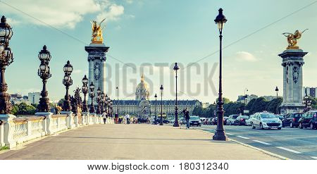 PARIS - SEPTEMBER 20, 2013: View of Alexandre III bridge in Paris. Alexandre III bridge is one of the top tourist destinations in Paris.