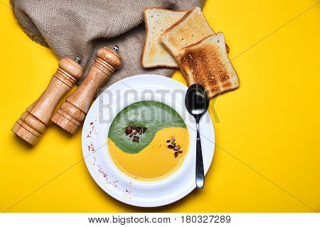 Spinach And Pumpkin Cream Soup With Fried Toast Bread