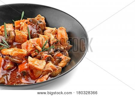 Chicken cacciatore in plate isolated on white