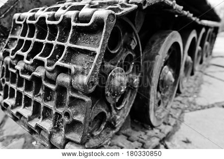 Detail Shot With Old Vintage Tank Tracks And Wheels.