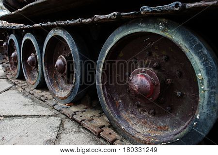 Detail Shot With Old Vintage Tank Tracks And Wheels.