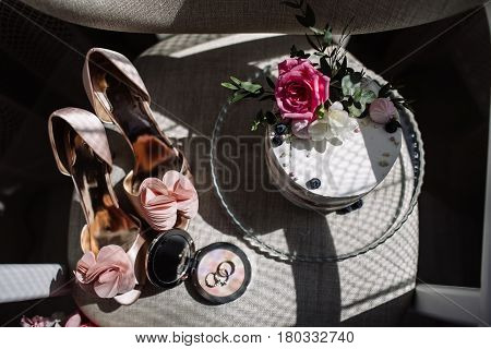 Wedding rings a bouquet of lavender and beige bridesmaid shoes