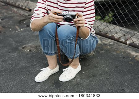 Woman traveler photographer holiday lifestyle trip
