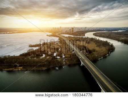 Aerial view of Moscow Strogino district at sunset, Russia. Stroginsky bridge over Moskva River.