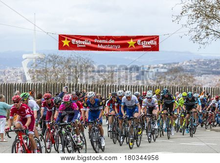 Barcelona Spain - March27 2016: The peloton riding during Volta Ciclista a Catalunya on the top of Montjuic in Bracelona Spain on March 27 2016.