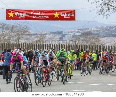 Barcelona Spain - March27 2016: The peloton riding during Volta Ciclista a Catalunya on the top of Montjuic in Bracelona Spain on March 27 2016.