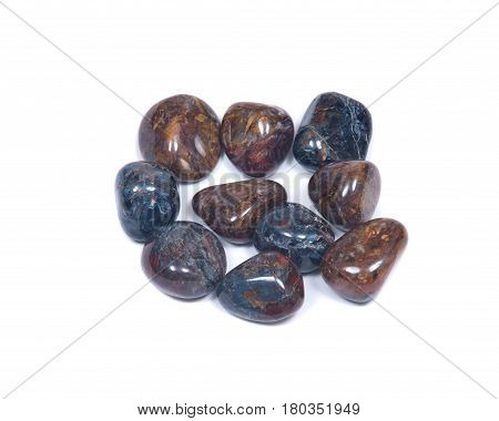 Tumbled pietersite from Namibia isolated on white background