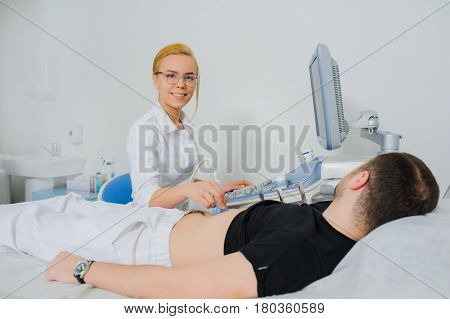Doctor Examine A Patient Abdomen Usg