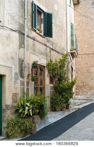 VALLDEMOSSA, SPAIN - MARCH, 2017: Idyllic street scene in Valldemossa on Mallorca island