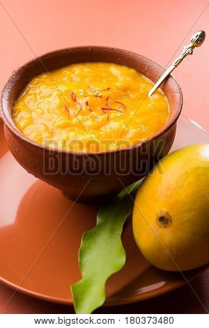 alphonso mango pulp or hapus aam ras or amba ras in marathi, selective focus