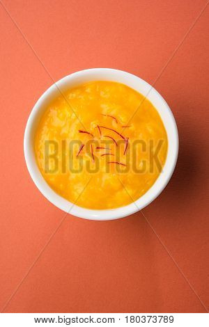 alphonso mango pulp or hapus aam ras or amba ras in marathi, selective focus