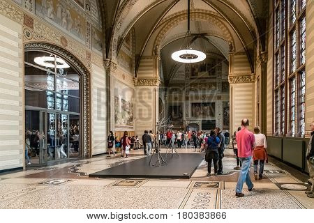 Amsterdam Netherlands - August 3 2016: Visitors in the interior of Rijksmuseum in Amsterdam