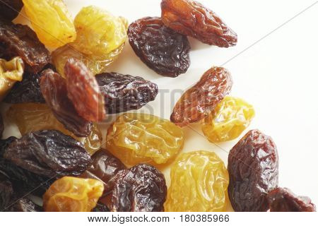 Raisin / A raisin is a dried grape. Raisins are produced in many regions of the world and may be eaten raw or used in cooking, baking, and brewing.