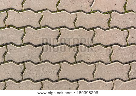 Texture of road surface with grey pave stones