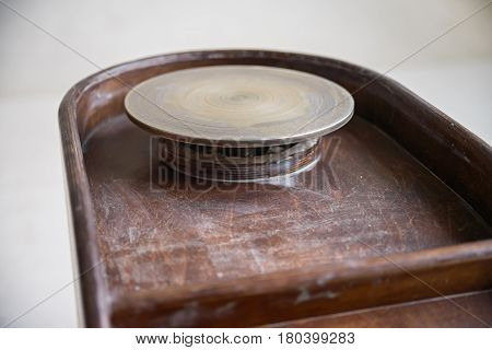 Closeup image of empty pottery wheel ready for use