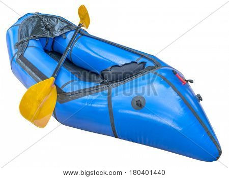 a blue packraft (one-person light raft used for expedition or adventure racing) with a paddle isolated on white with a clipping path