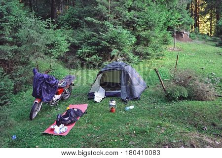 Traveling on a motorcycle a single overnight stay in a tent in a strange place