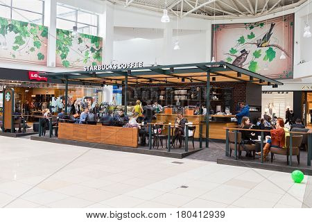 Samara Russia - April 1 2017: Starbucks cafe interior in Samara shopping center Kosmoport. Starbucks Corporation is an American global coffee company and coffeehouse chain