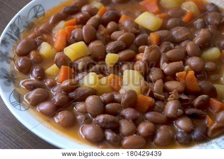 Kidneys meal. Carrot and potatoes cooked with kidneys meal: Barbunya Pilaki