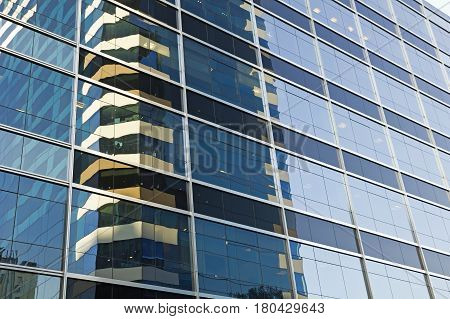Modern glass reflection on a modern building.