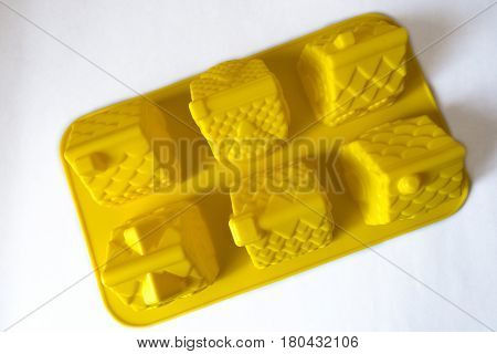 Bright yellow silicone baking case (house shaped)