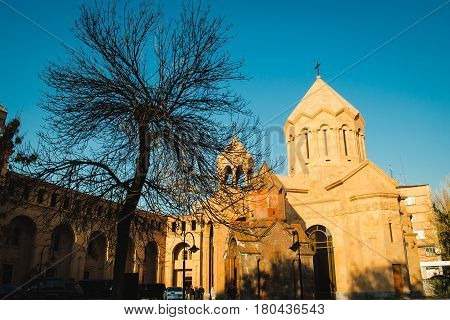 Photo of the Katoghike the oldest surviving church in Yerevan and new religious complex of residence of the Catholicos with Saint Anna Church. Architecture concept. City center. Armenia