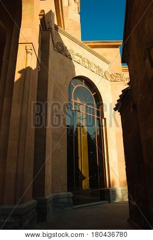 Photo of the Church tall arced window. Saint Anna Church. Armenian architecture. Yerevan City center, Armenia. Religious background. Exterior concept.