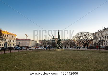 SAINT- PETERSBURG RUSSIA - DECEMBER 27 2015: Saint Isaac's Square or Isaakiyevskaya Ploshchad in Saint Petersburg Russia is a major city square sprawling between the Mariinsky Palace and Saint Isaac's Cathedral