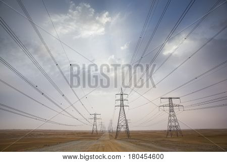 Power Line In A Desert Near Abu Dhabi