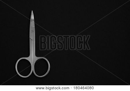Scissors For Manicure Woman Nails On A Black Background. Tools