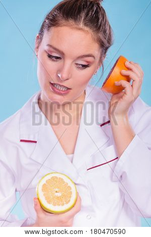 Happy Dietitian Nutritionist With Grapefruit.
