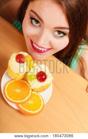 Woman Looking At Delicious Sweet Cake. Gluttony.