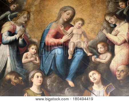 ROME, ITALY - SEPTEMBER 03: Madonna and Child with Saints in Chapel of Our Lady, Basilica di Sant Andrea delle Fratte, Rome, Italy on September 03, 2016