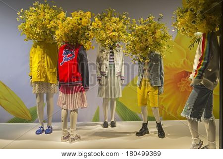 PARIS FRANCE - MARCH 27 2017: Mannequins in the showcase of the Printemps department store in Paris France. Spring and summer theme.