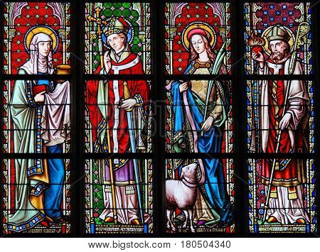 Stained Glass In Sablon Church - Saints Joanna, Eugene, Agnes And Augustine