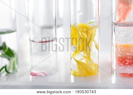 Test tubes with perfume samples, closeup