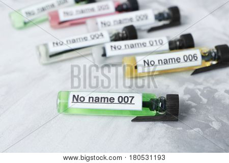 Perfume samples on light background