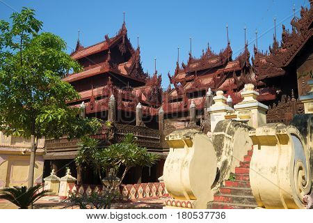 A fragment of the complex of buildings of the ancient teak wood Buddhist monastery Shwe In Bin Kyaung. Mandalay. Burma