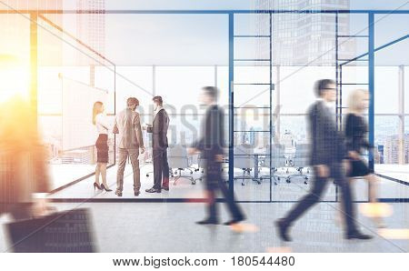 Rear view of businesspeople standing and passing by a meeting room with glass walls in a busy office. Toned image double exposure. 3d rendering