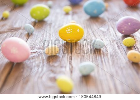 Colorful Easter Egg With Flowers On Brown Rustic Wood Background. Happy Easter.